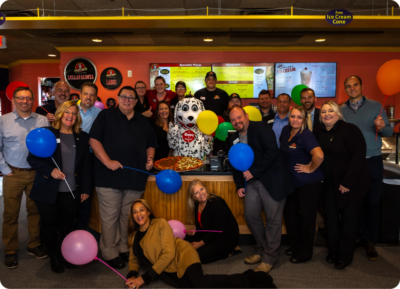 Group Image at a Happy Joe's restaurant.