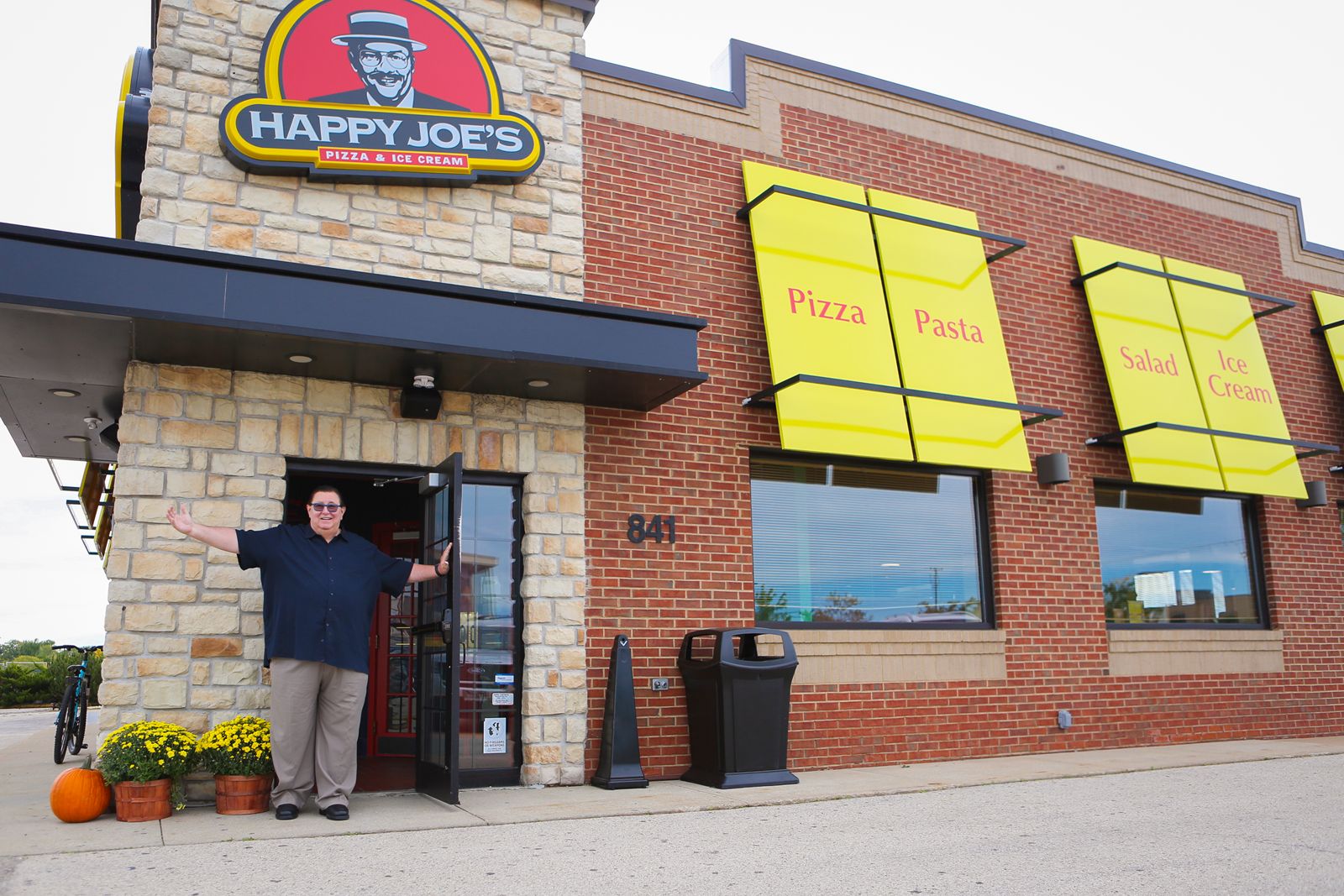 Tom Sacco in front of Happy Joe's Fond du Lac