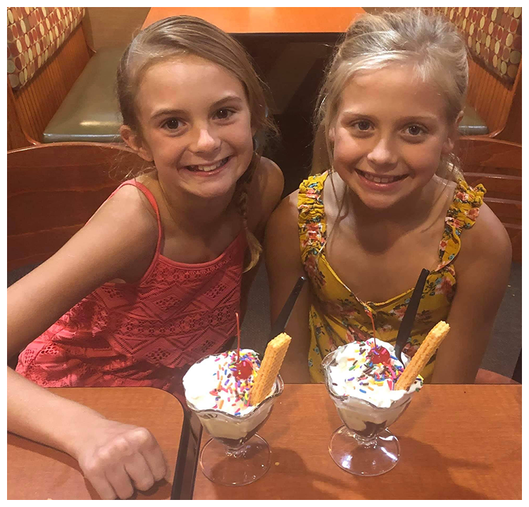 Two young guests ready to enjoy some Happy Joe's sundaes