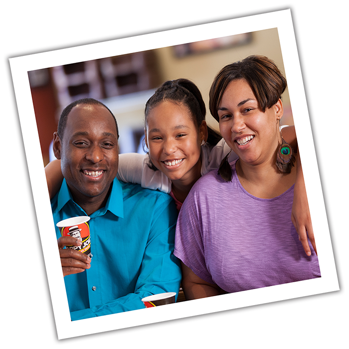 Photograph style image of a family with Happy Joe's cups.